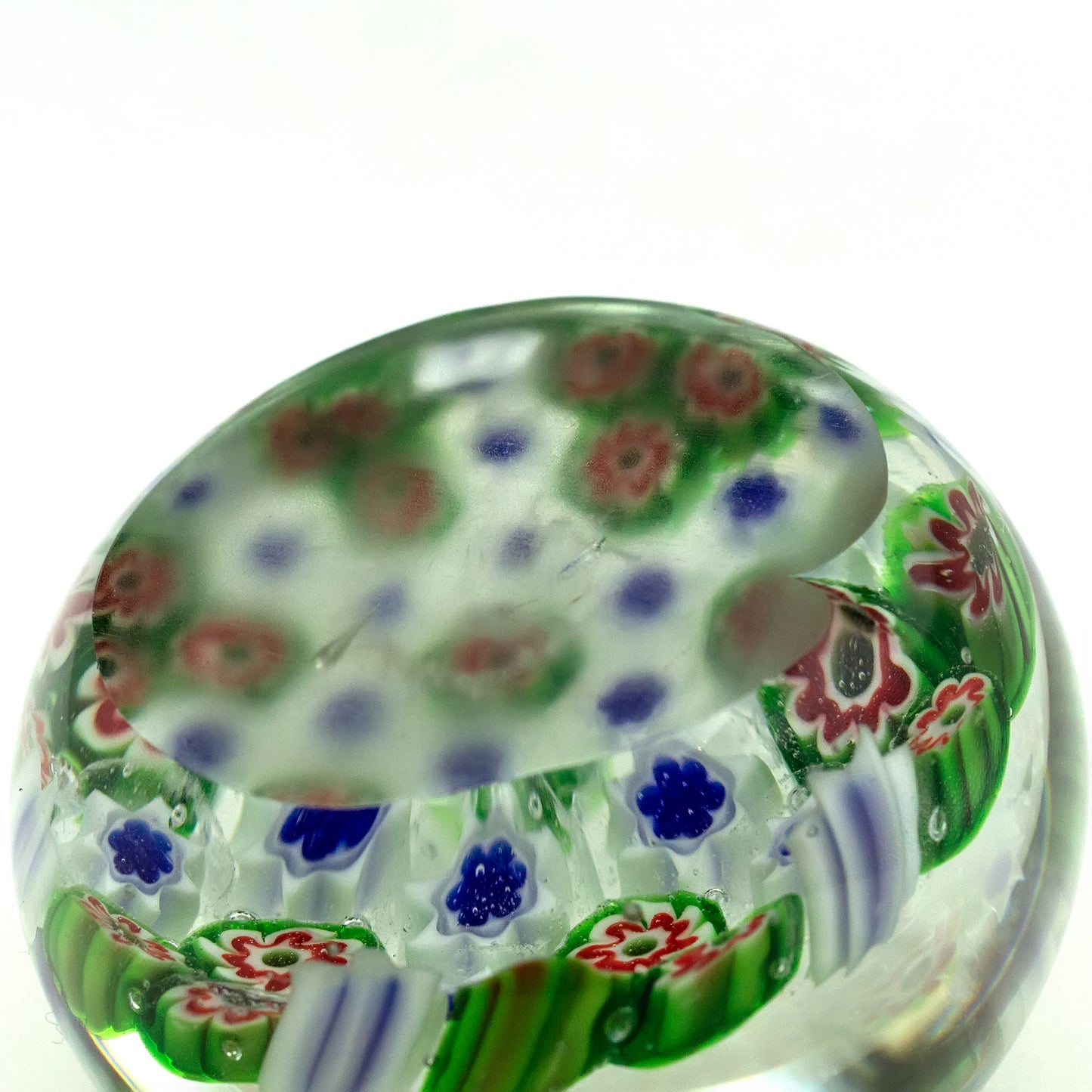Green-red Murano glass paperweight