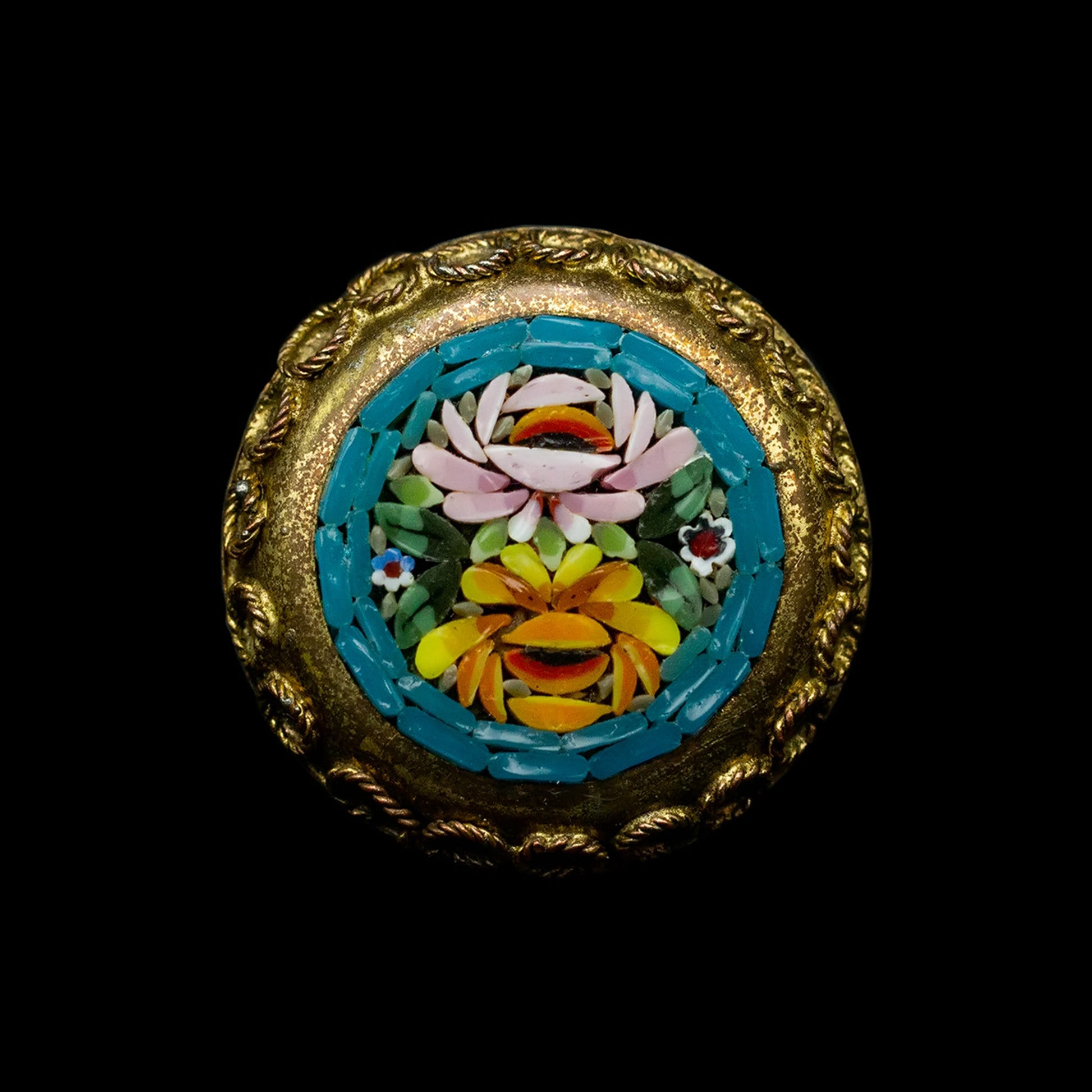 Round Italian brooch with Florentine micromosaic in a brass frame