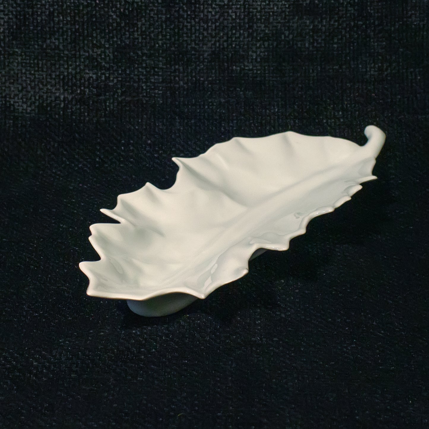 leaf shaped white porcelain dish