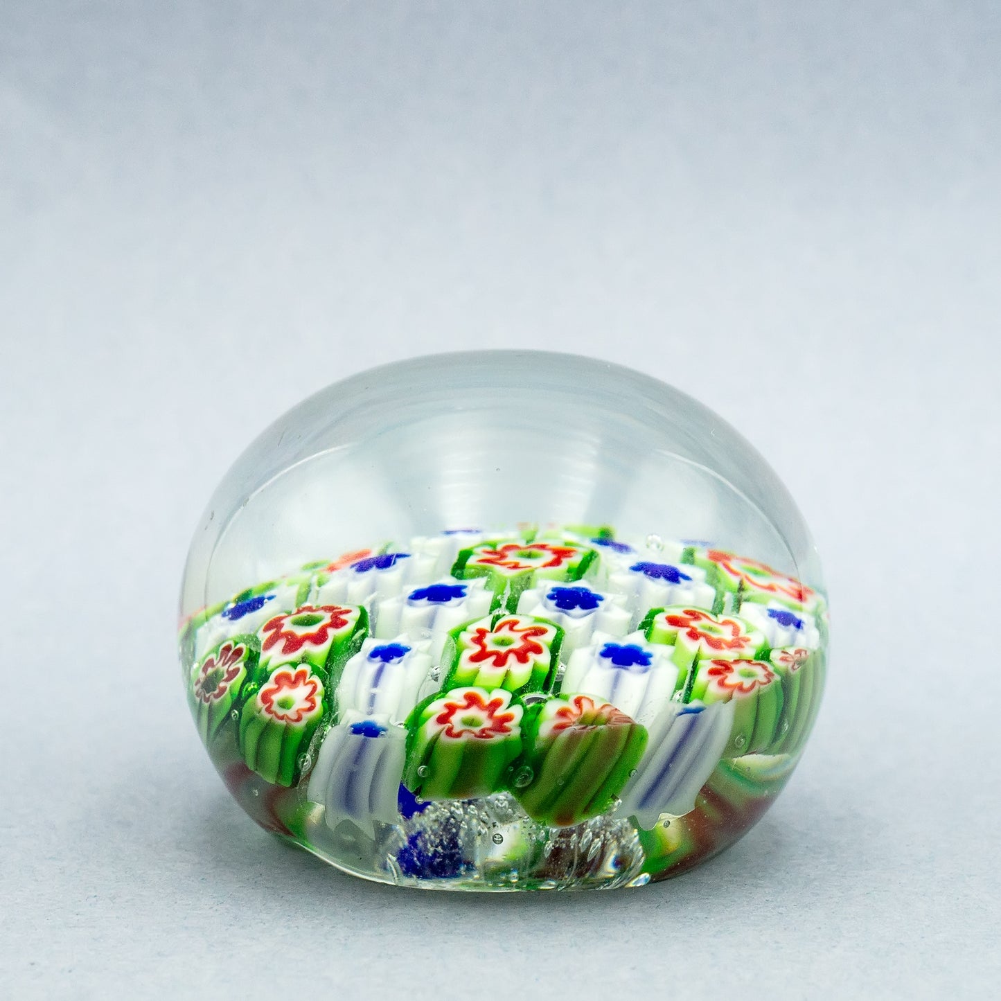 Green-red Murano glass paperweight