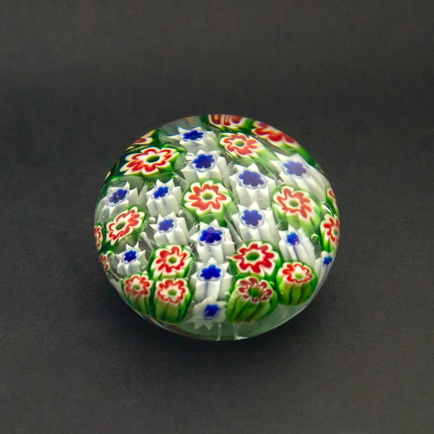 Green-red Murano glass paperweight