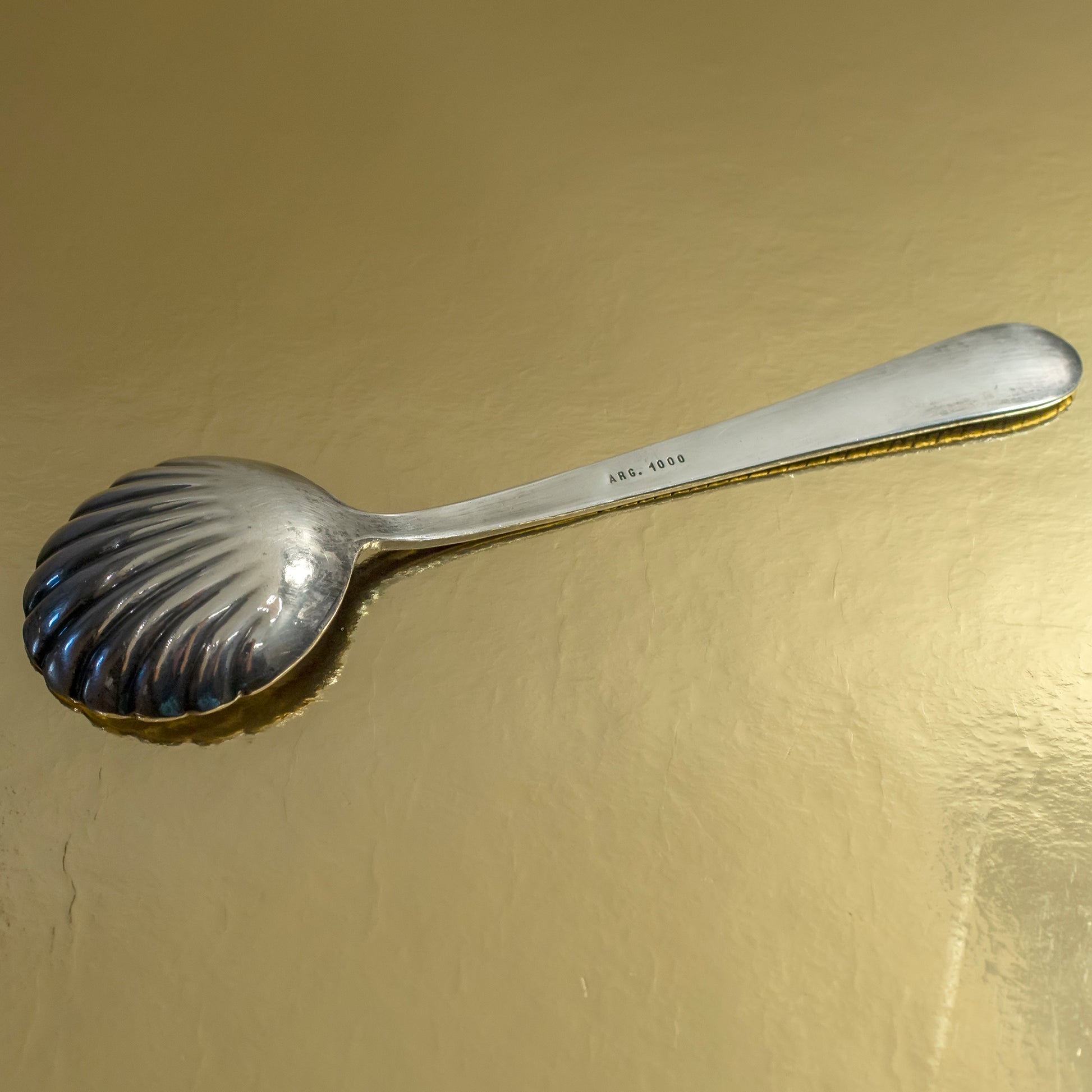 Small silver serving spoon