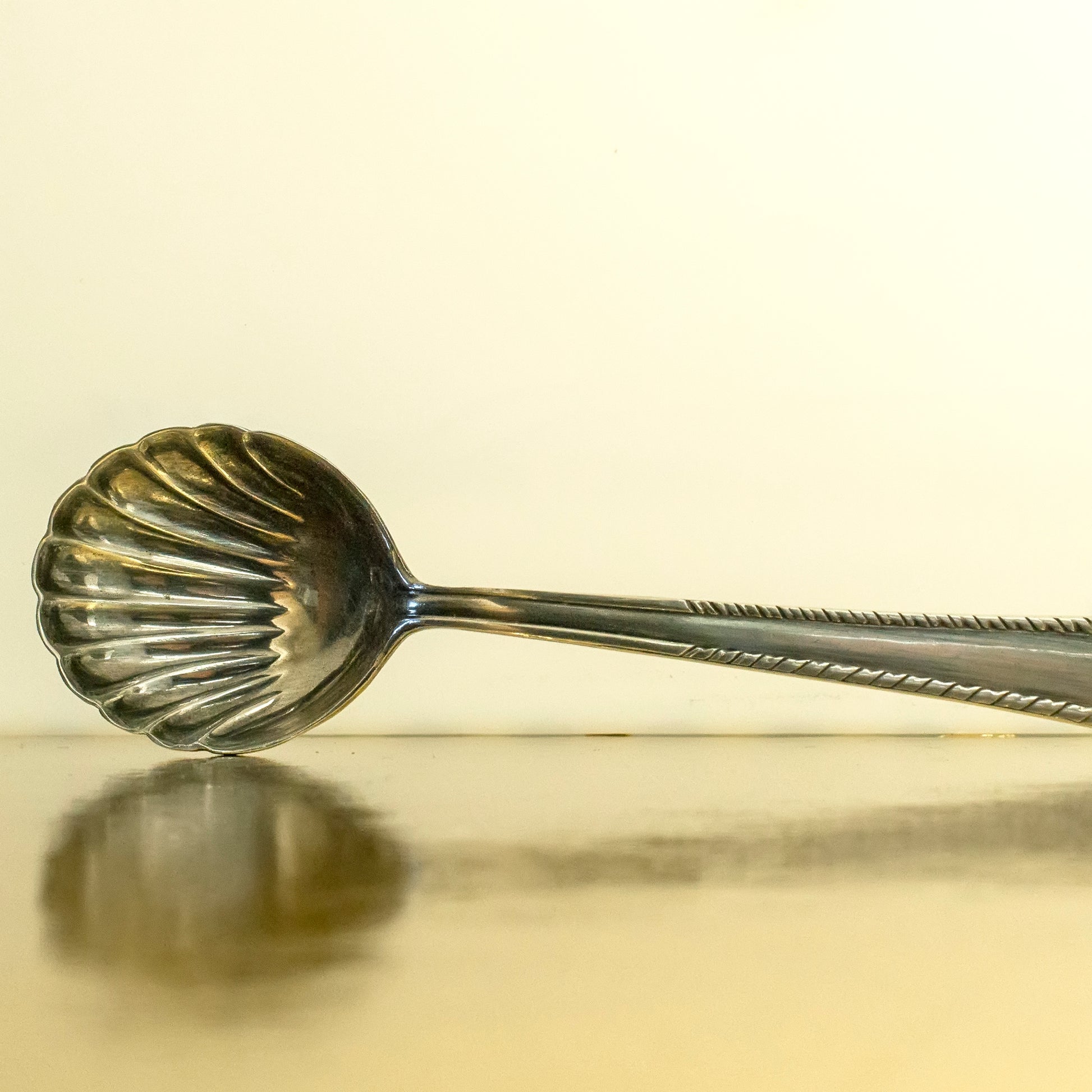 Small silver serving spoon