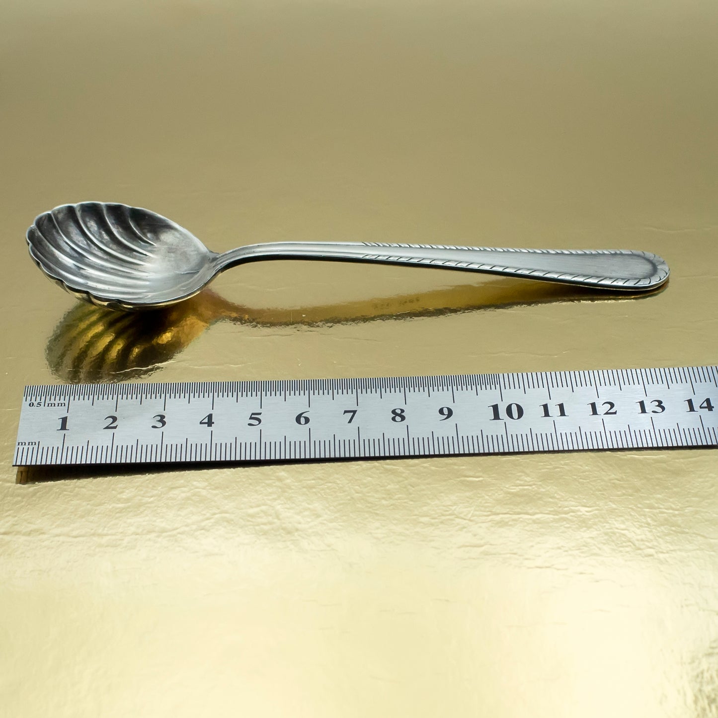 Small silver serving spoon