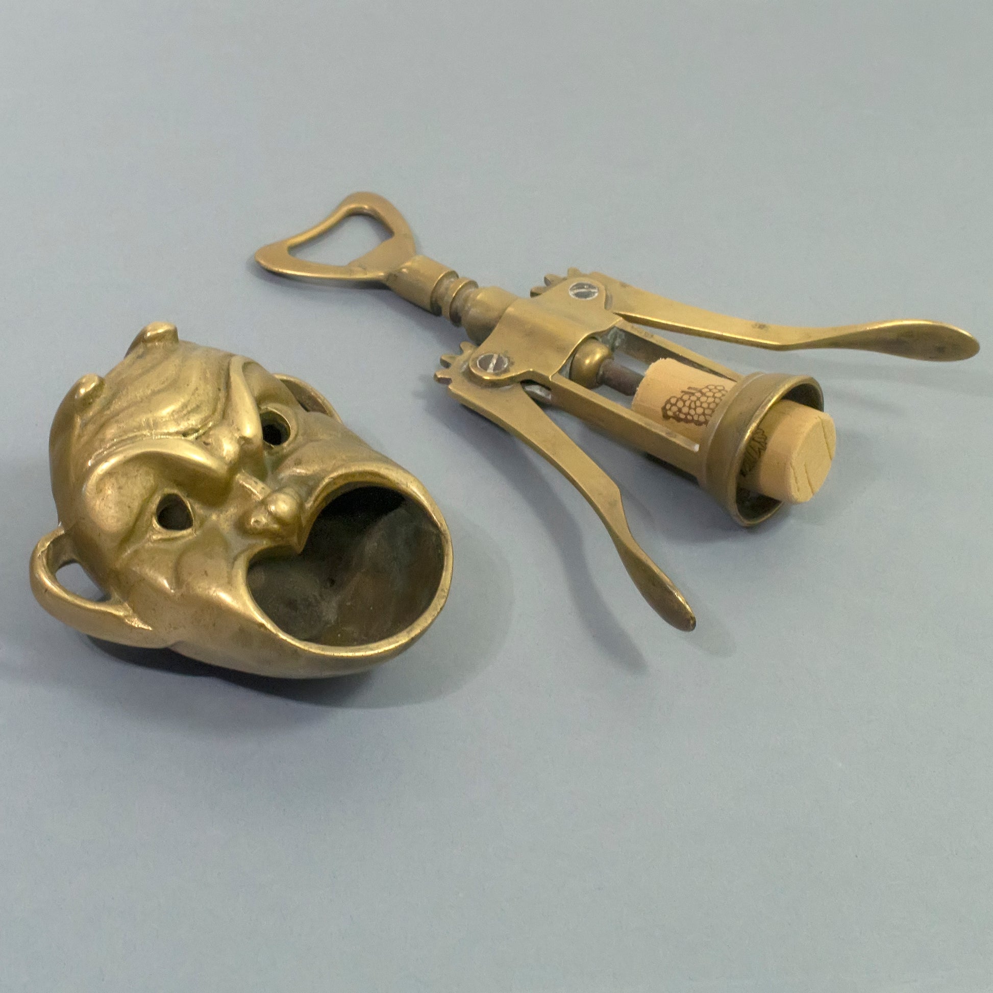 Mask brass ashtray