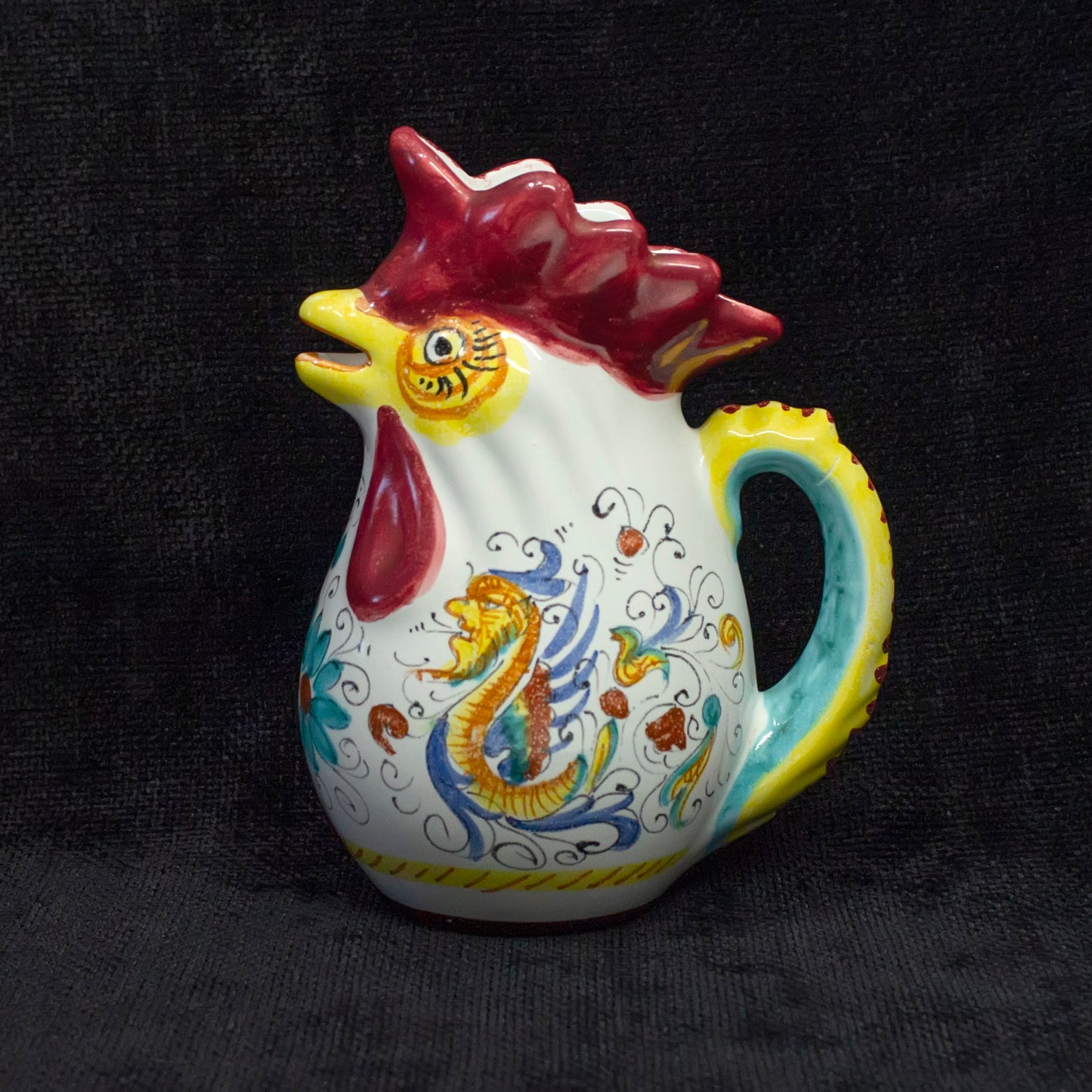 Red-blue-yellow ceramic rooster pitcher