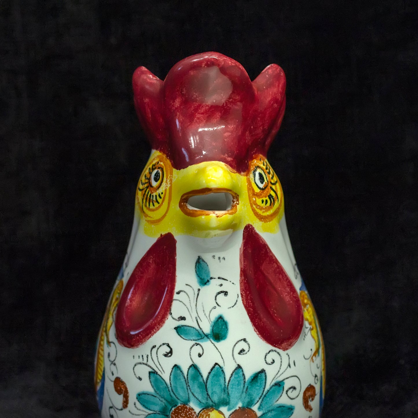 Red-blue-yellow ceramic rooster pitcher