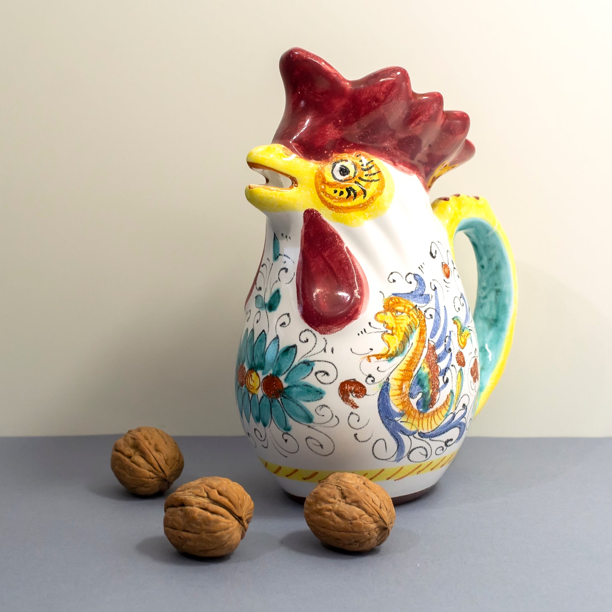 Red-blue-yellow rooster pitcher