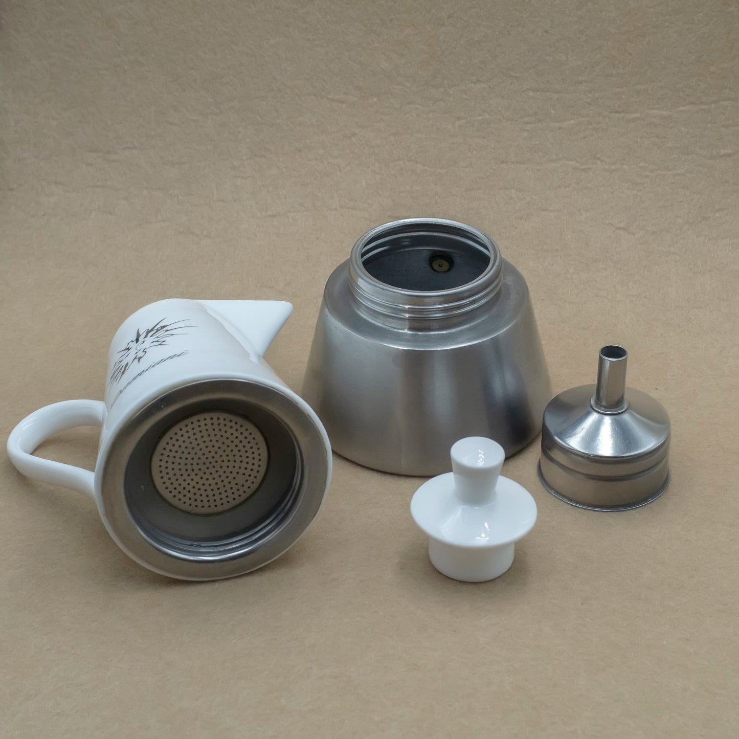 Steel coffee maker with ceramic top