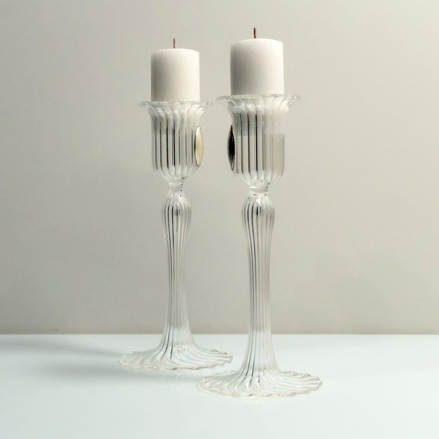 Two Murano glass candlesticks