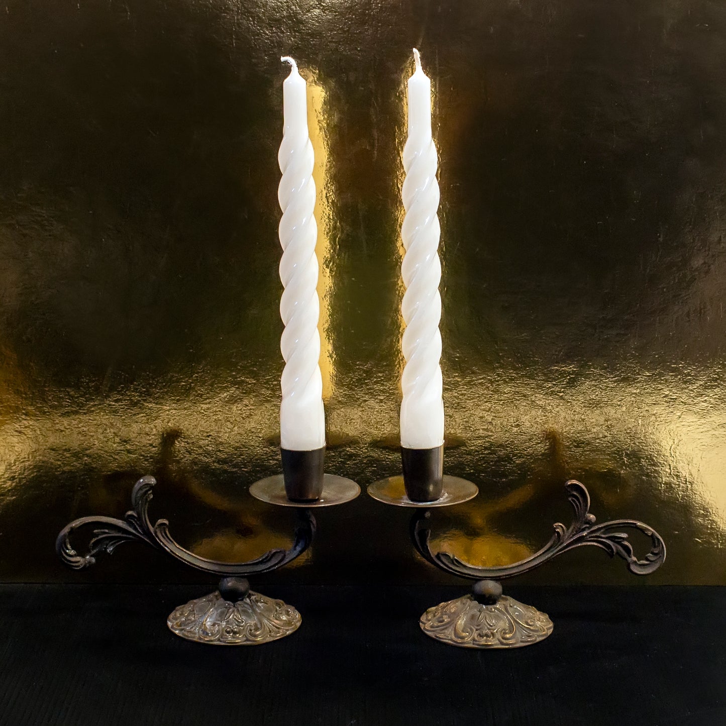 Two brass candle holders