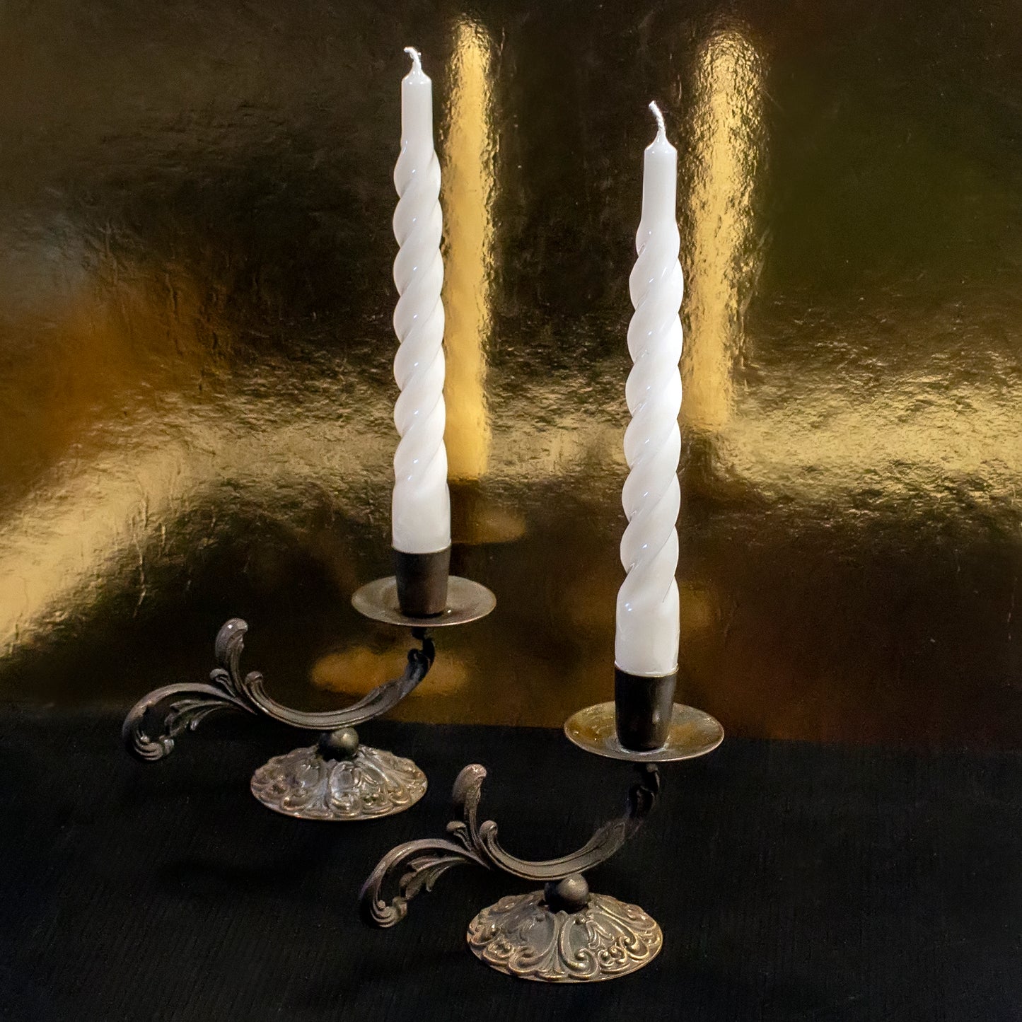 Two brass candle holders