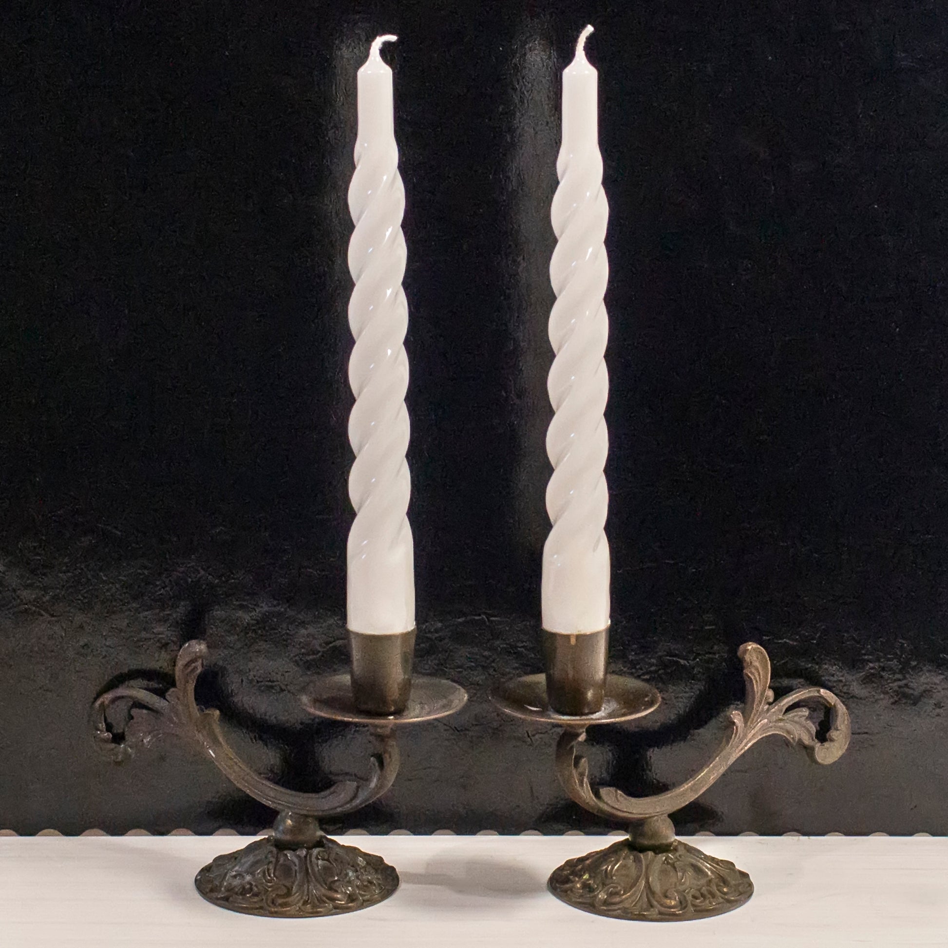 Two brass candle holders