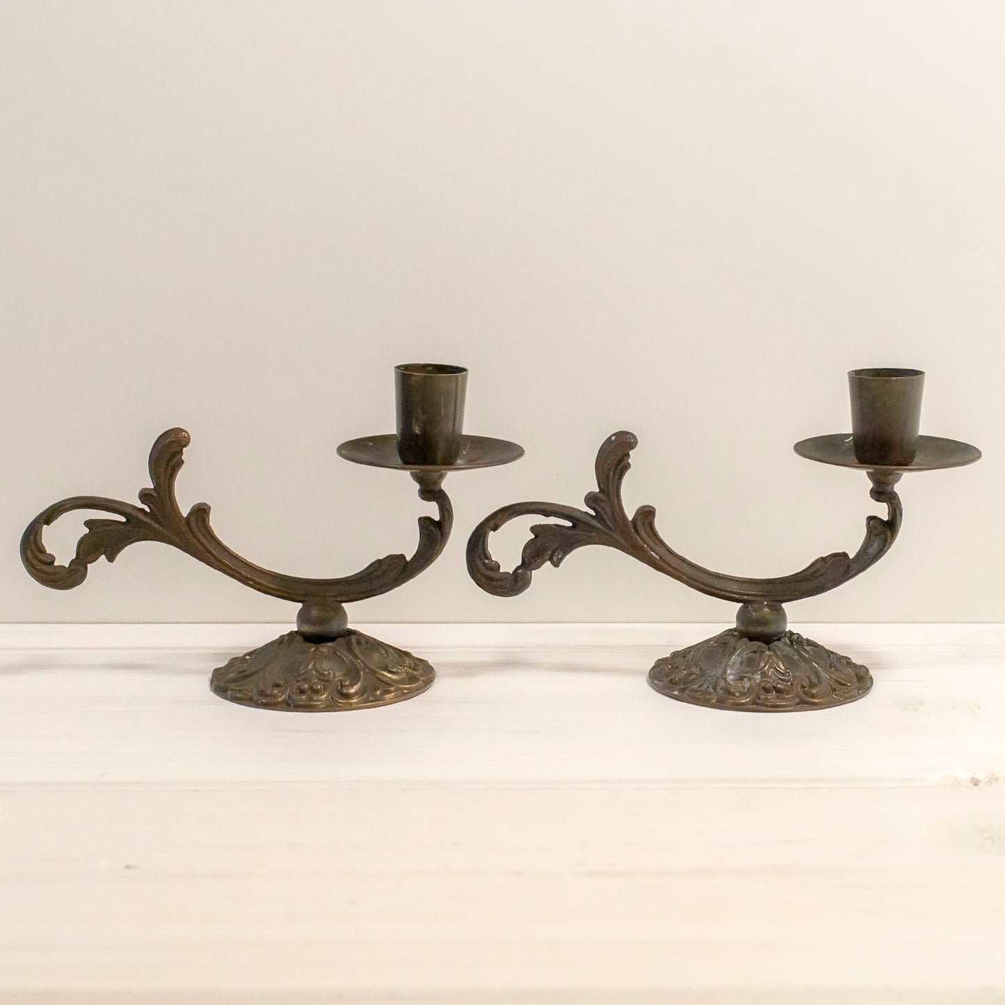 Two brass candle holders