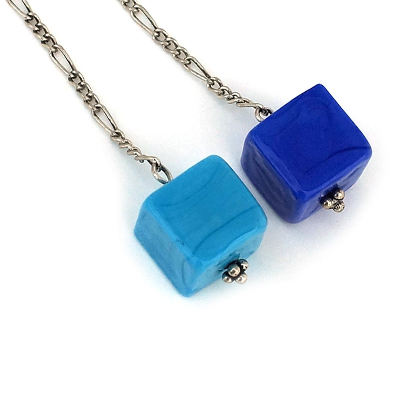 Two blue Murano glass cubes on silver chains